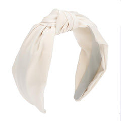Etercycle front view beige headband showing neat style and everyday polish