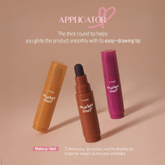 ETUDE marker in hand to show compact size and travel convenience