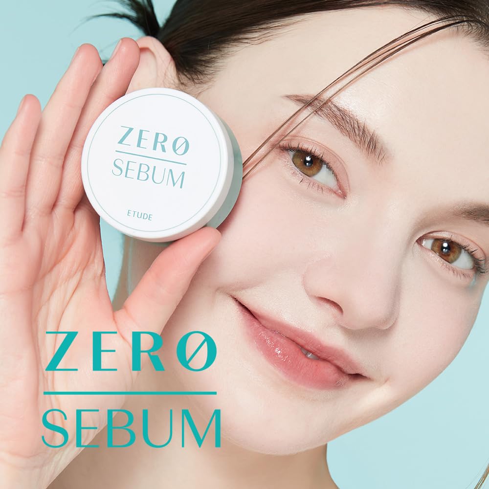 ETUDE held in hand to show travel-friendly 4g size for touch-ups
