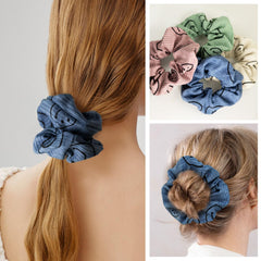 Eunoir scrunchie holding a high ponytail in place without creasing
