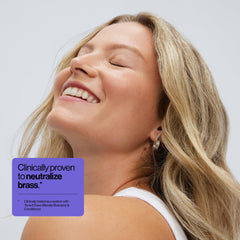 EVA·NYC creamy purple conditioner texture close-up showing rich moisturizing formula