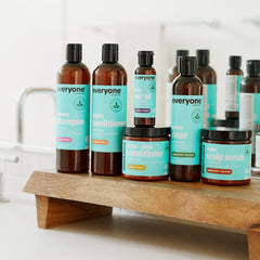 everyone applying conditioner to wet hair demonstrating detangling benefit