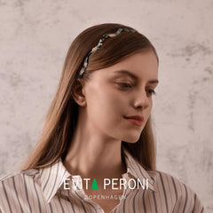 EVITA PERONI worn with glasses demonstrating no interference and comfort