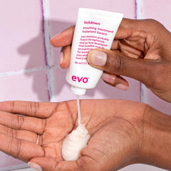 EVO bottle inside travel pouch with styling kit showing portability benefit