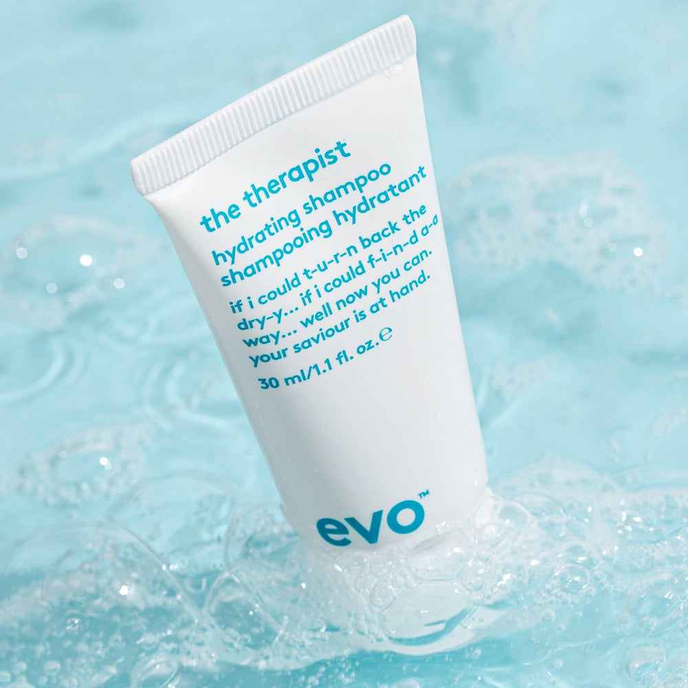 EVO shampoo lathering on wet hair to show gentle cleansing action