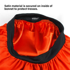 Evolve satin sunset bonnet beside ruler showing roomy interior size and scale