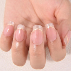 evpct hand applying a press-on nail using included adhesive tabs for fast application