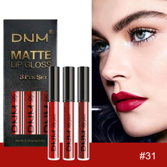 evpct lip model wearing deep ruby showing bold, long-lasting color