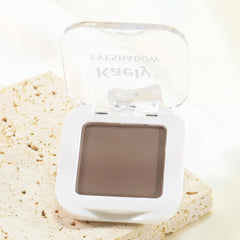 evpct matte brown beside a coin showing mini size for travel convenience benefit