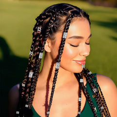 Exircy festival hairstyle with beads showing bold decorative impact