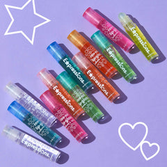 Expressions Girl lip gloss on lips providing glossy shine and subtle fruit scent