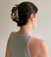 Eyegla clip used during skincare routine keeping hair tidy and out of face