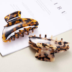 Eyegla clips securing thick hair with no slip for confident all-day wear