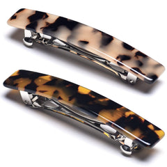 Eyegla front packaging showing two tortoise shell barrettes and neat gift box, elegant presentation