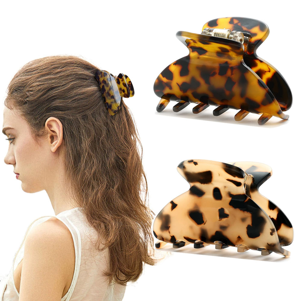 Eyegla front view of two tortoise shell clips showing classic pattern and neat packaging, offering polished style