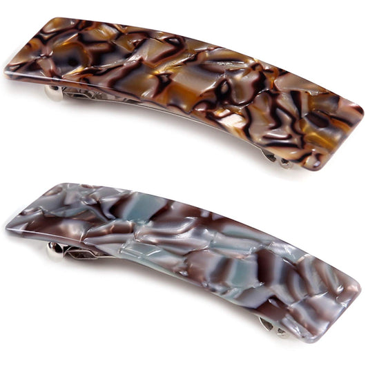 Eyegla front view of tortoise shell barrettes showing elegant pattern and polished finish