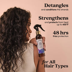 Fable & Mane bottle in hand for size comparison and travel-friendly benefit