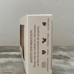 Hand holding Fabulous Frannie 4 oz bar to show scale and convenient travel size benefit