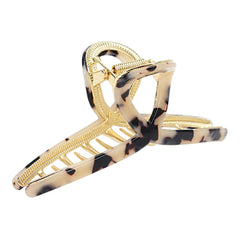 FAELBATY clip front view showing light leopard pattern and polished finish benefit style