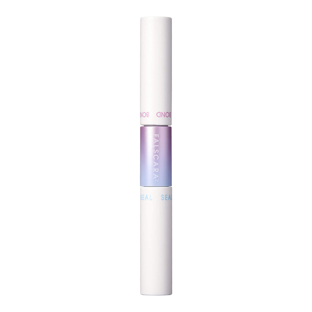FALSCARA KISS tube next to a coin showing compact travel-friendly size
