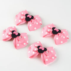 Fancheer bow clipped into a ponytail, adds instant costume charm