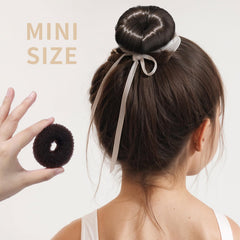 Fandamei elastics and bobby pins arranged to show secure styling support