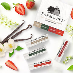 Farm & Bee strawberry and cherry flatlay displaying fruity options for daily use