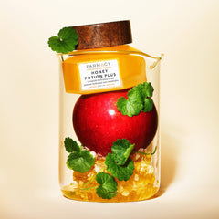 Farmacy ingredients flatlay with honey, apple extract and ceramides benefits