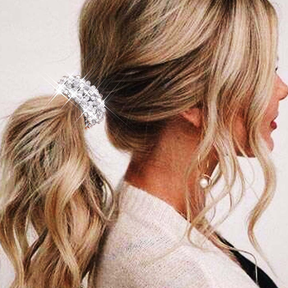 Fashey scrunchie securing a chic bun, decorative and secure hold