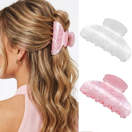Fashey front view of pink and white medium claw clip showing color and shape, stylish accessory