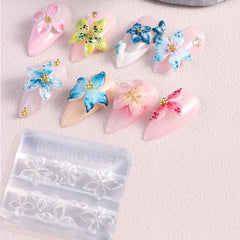 Fcozpjk 3D flower charm on nail showcasing raised design and pearly iridescent finish