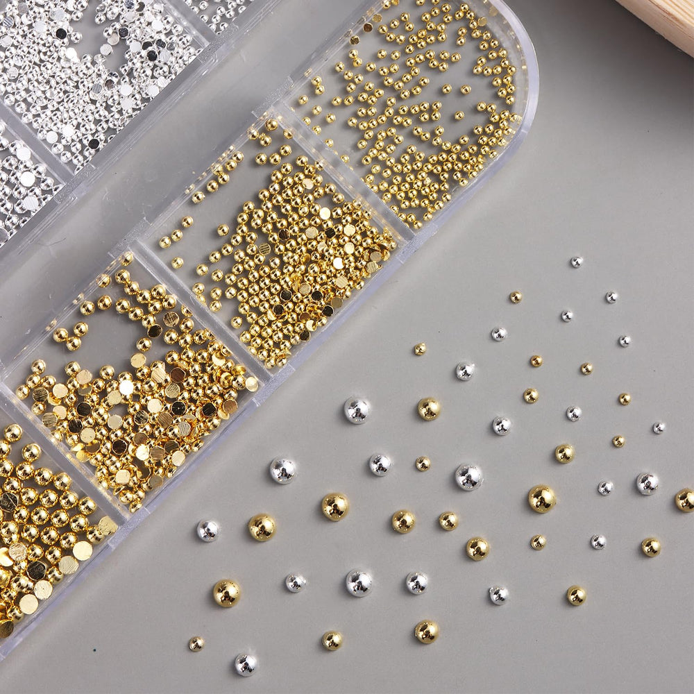 Fcozpjk beads applied to manicured nails showcasing metallic shine and textured design