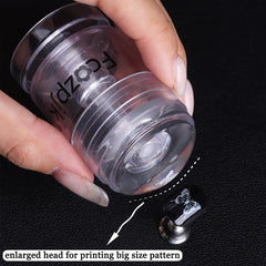 Fcozpjk plastic scraper close-up to remove excess polish and clean stamp surface