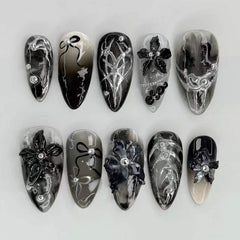 FDSQHSA front packaging showing black floral almond nails and benefits display
