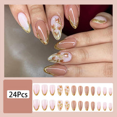 FDSQHSA hand wearing press-on nails showing true-to-size fit and almond silhouette