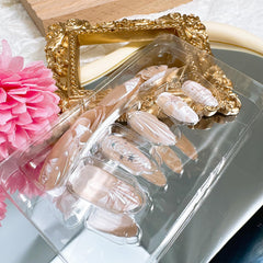 FDSQHSA pearl accent detail on nail providing subtle ocean-inspired shine