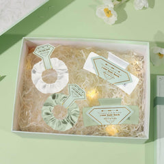 Featch bronzed decorative card close-up showing printed phrase benefit photo-ready proposal reveal