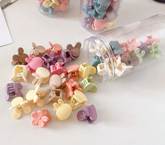 Feilguee close-up of Mickey-shaped clip detailing for secure gentle hold