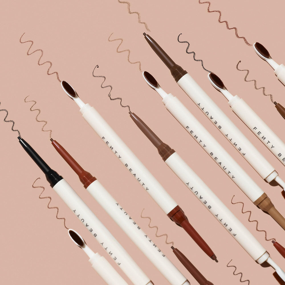 Fenty Beauty Brow MVP held in hand illustrating compact travel-friendly scale