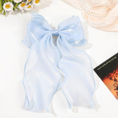 FidesAmor worn on ponytail demonstrates how the bow adds polished movement