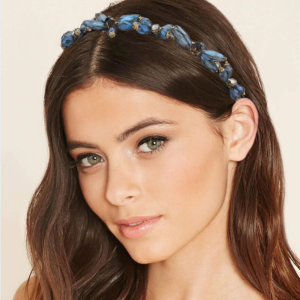Firuilo headband next to hand showing scale and lightweight design benefit