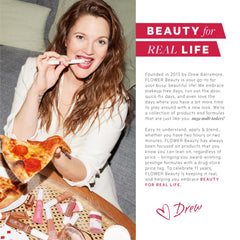 FLOWER BEAUTY lipstick in hand while applying, illustrating easy use and wearable everyday shade