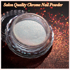 FNNZ powder on black base nails showing intense mermaid chrome reflection