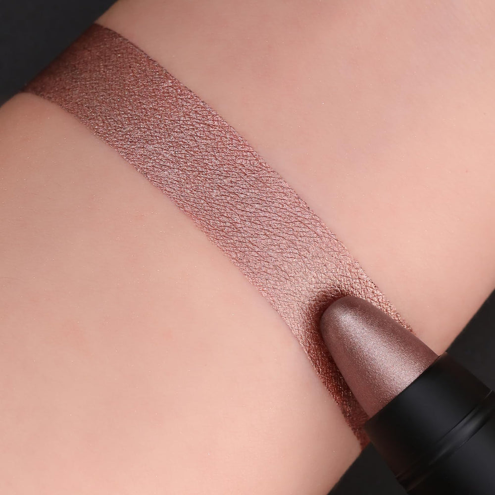 FOCALLURE crayon held in hand to show compact size and easy carry convenience