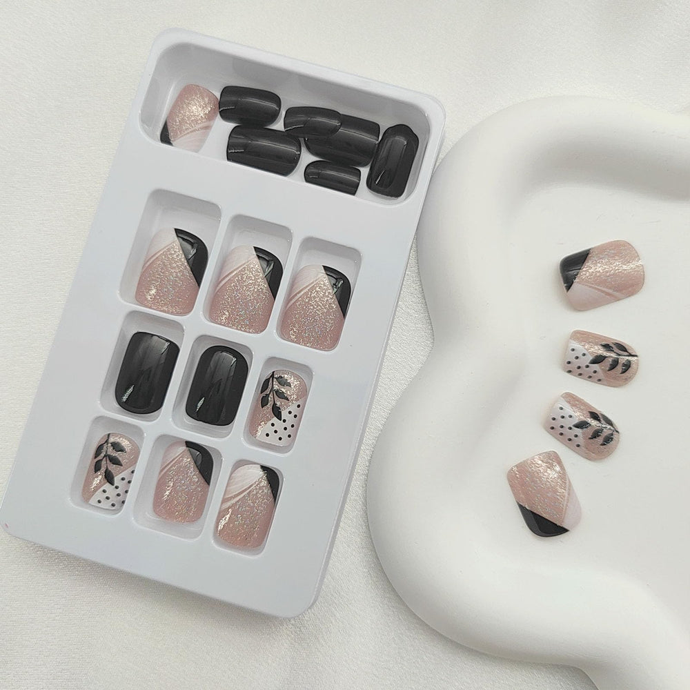 FOLONRAL close view of black-and-white French tip nails highlighting clean, modern contrast