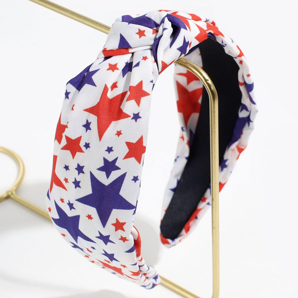 FOLONRAL next to hand showing size and lightweight, travel-ready benefit