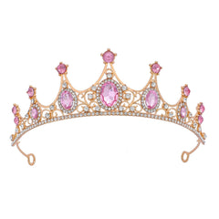 FORSEVEN gold tiara front view showing regal shape and balanced height