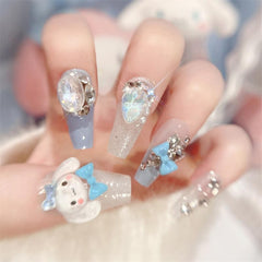 Foweso front packaging showing full 24-piece nail kit and charms benefit