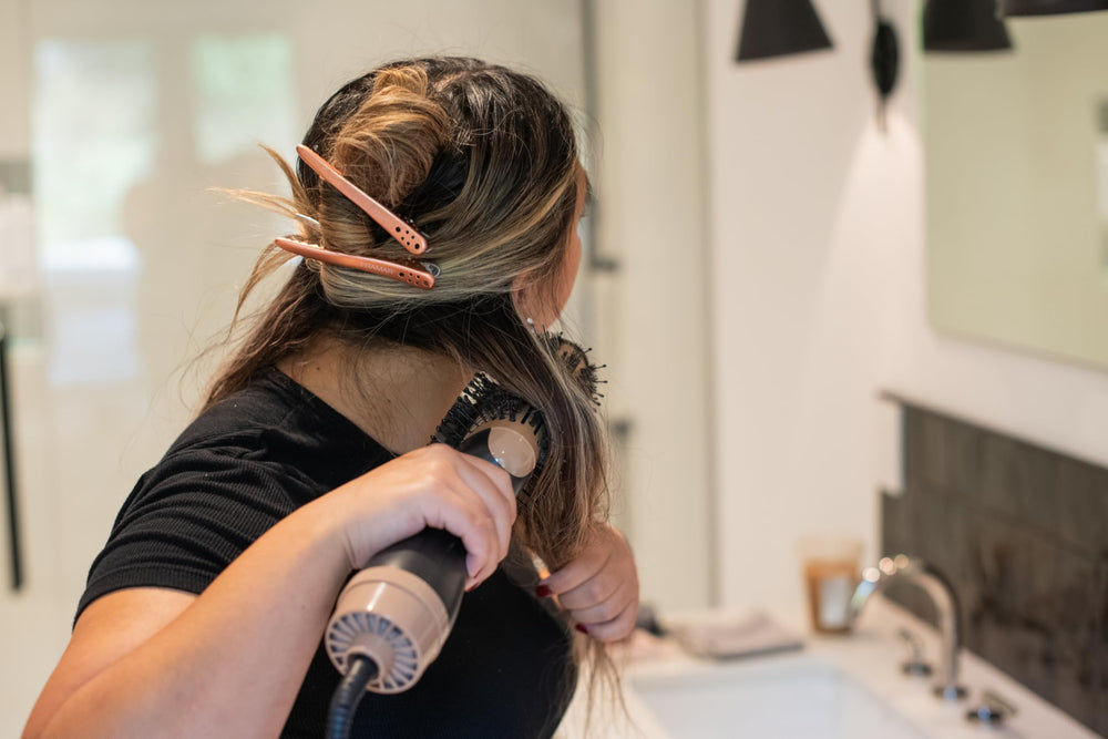 FRAMAR clip holding a hair section in place for styling and coloring
