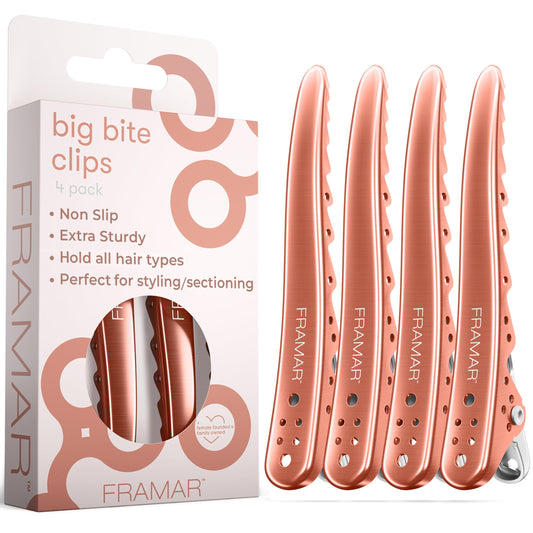 FRAMAR front view of four rose-gold metal clips showing professional finish and durability